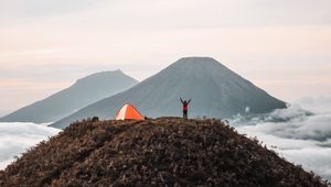 Preview wallpaper mountains, tent, person, camping, nature