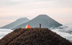 Preview wallpaper mountains, tent, person, camping, nature