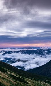 Preview wallpaper mountains, top, clouds, sunset, sky, porous