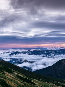 Preview wallpaper mountains, top, clouds, sunset, sky, porous