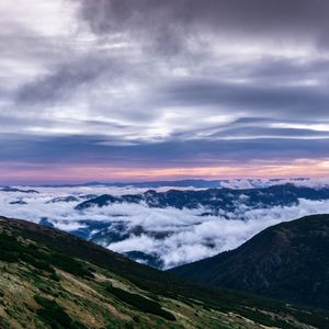 Preview wallpaper mountains, top, clouds, sunset, sky, porous