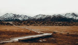 Preview wallpaper mountains, trail, grass, sky