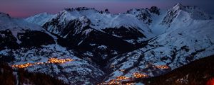 Preview wallpaper mountains, trees, aerial view, light, snow, peaks