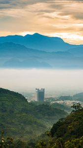 Preview wallpaper mountains, trees, buildings, nature