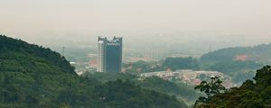Preview wallpaper mountains, trees, buildings, nature