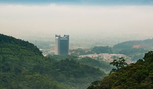 Preview wallpaper mountains, trees, buildings, nature