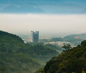 Preview wallpaper mountains, trees, buildings, nature