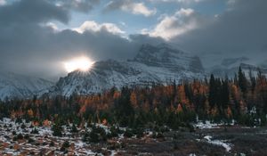 Preview wallpaper mountains, trees, clouds, sun, aerial view, landscape