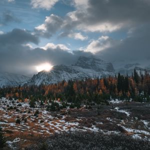 Preview wallpaper mountains, trees, clouds, sun, aerial view, landscape