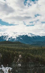 Preview wallpaper mountains, trees, distance, snow, clouds