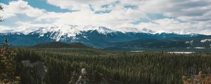 Preview wallpaper mountains, trees, distance, snow, clouds