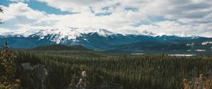 Preview wallpaper mountains, trees, distance, snow, clouds