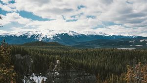 Preview wallpaper mountains, trees, distance, snow, clouds