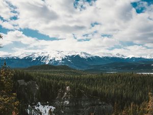 Preview wallpaper mountains, trees, distance, snow, clouds