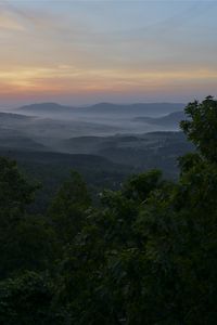 Preview wallpaper mountains, trees, fog, dusk, landscape