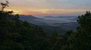 Preview wallpaper mountains, trees, fog, dusk, landscape