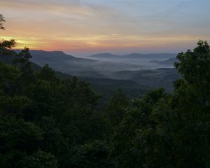 Preview wallpaper mountains, trees, fog, dusk, landscape