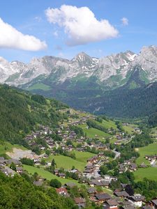 Preview wallpaper mountains, trees, houses, village, landscape, aerial view