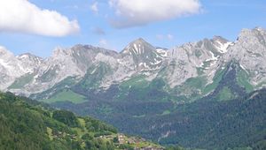 Preview wallpaper mountains, trees, houses, village, landscape, aerial view