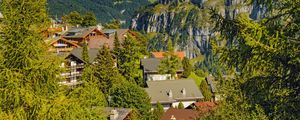 Preview wallpaper mountains, trees, houses, roofs, nature