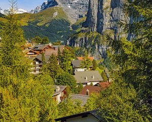 Preview wallpaper mountains, trees, houses, roofs, nature