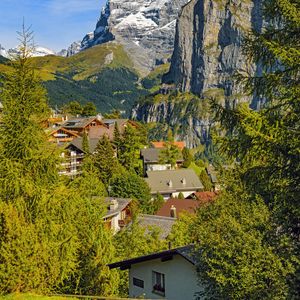 Preview wallpaper mountains, trees, houses, roofs, nature