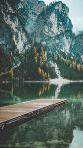 Preview wallpaper mountains, trees, lake, pier, reflection, italy