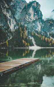 Preview wallpaper mountains, trees, lake, pier, reflection, italy