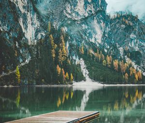 Preview wallpaper mountains, trees, lake, pier, reflection, italy