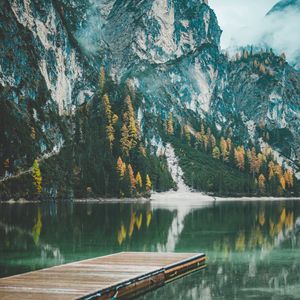 Preview wallpaper mountains, trees, lake, pier, reflection, italy