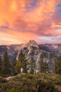 Preview wallpaper mountains, trees, man, nature, loneliness