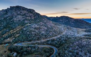 Preview wallpaper mountains, trees, road, sunset