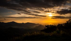 Preview wallpaper mountains, trees, silhouettes, sun, sunset, dark