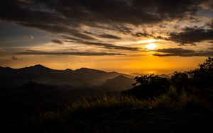 Preview wallpaper mountains, trees, silhouettes, sun, sunset, dark