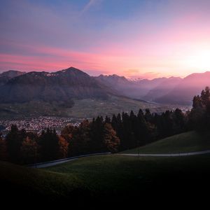 Preview wallpaper mountains, trees, sky, dawn, switzerland