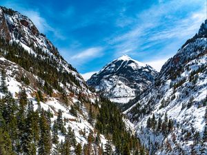 Preview wallpaper mountains, trees, slope, snow, view