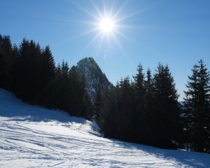 Preview wallpaper mountains, trees, snow, rays, sun, nature, winter