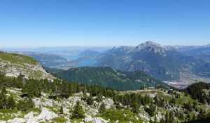 Preview wallpaper mountains, trees, stones, lake, horizon, view, landscape