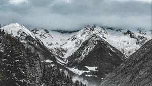 Preview wallpaper mountains, trees, winter, snow, clouds