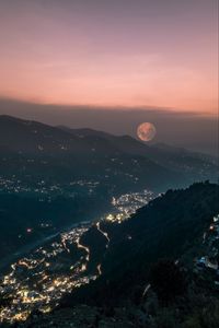 Preview wallpaper mountains, valley, city, lights, moon, fog, night