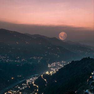 Preview wallpaper mountains, valley, city, lights, moon, fog, night