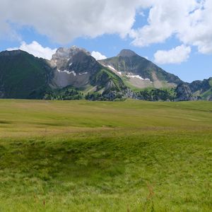 Preview wallpaper mountains, valley, grass, relief, landscape