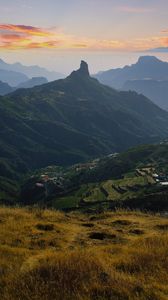 Preview wallpaper mountains, valley, houses, grass, slope