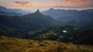 Preview wallpaper mountains, valley, houses, grass, slope