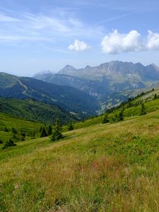 Preview wallpaper mountains, valley, lawn, grass, trees, landscape