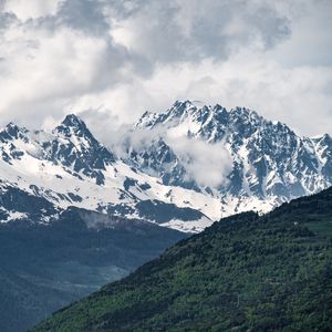 Preview wallpaper mountains, valley, peaks, snowy, trees, sky