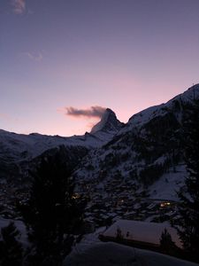 Preview wallpaper mountains, valley, snow, buildings, dusk