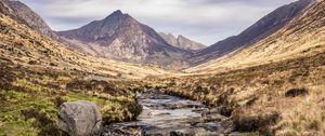 Preview wallpaper mountains, valley, stream, stones, water, landscape