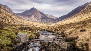 Preview wallpaper mountains, valley, stream, stones, water, landscape