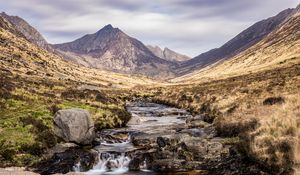 Preview wallpaper mountains, valley, stream, stones, water, landscape